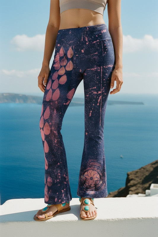 Flared pants with pink abstract design on a white background