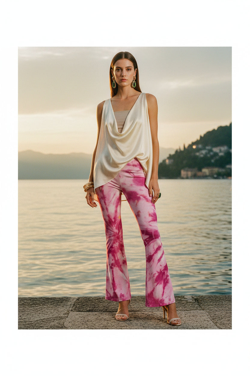 Pink and white tie-dye pants on a white background
