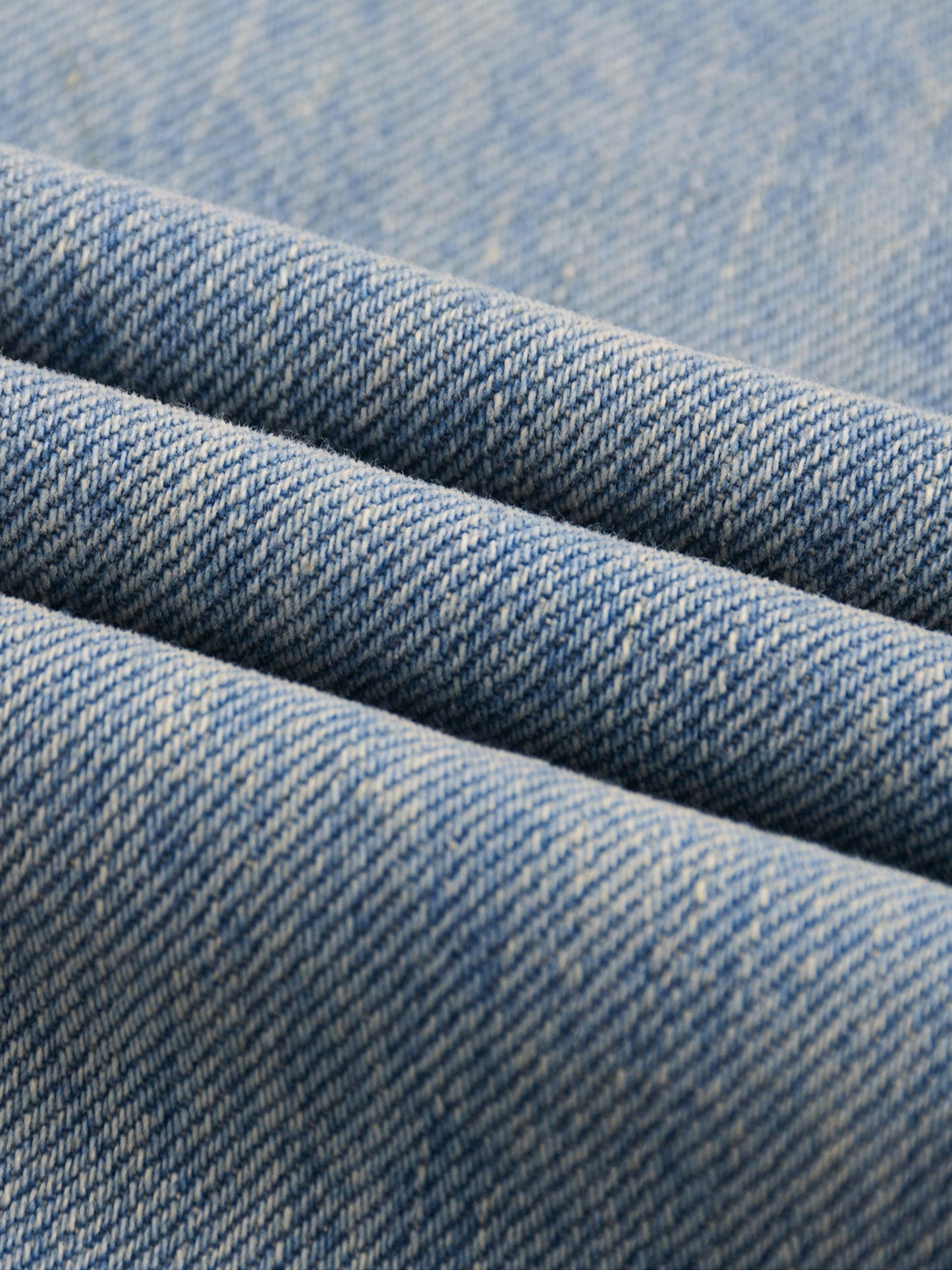 1986 Glyphs Sun Fade Raw Hem Denim Jeans